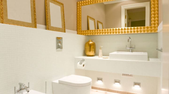 Bathroom mirror with gold leaf